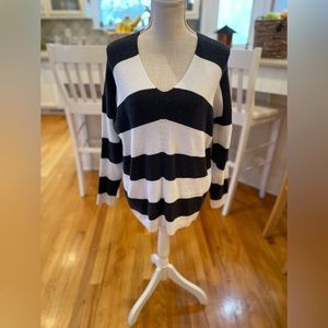 Reborn J. Gray and white knitted v-neck sweater